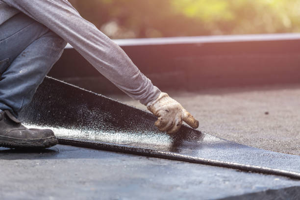 Professional Basement Waterproofing technician working in Bridgeport, NY